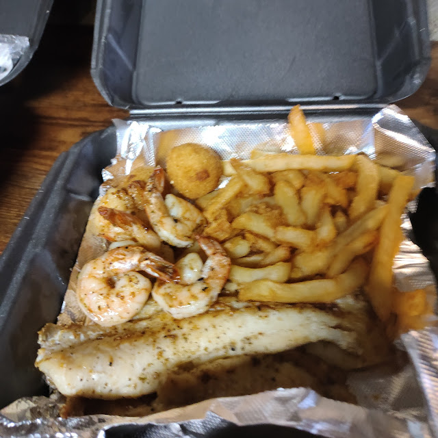 Grilled Flounder and Shrimps and Fries and Hush Puppies