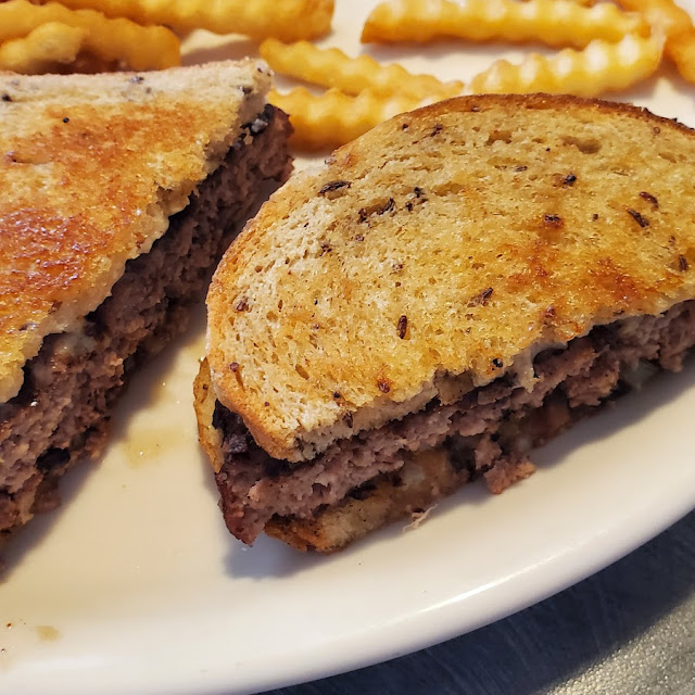 Patty Melt on Sourdough Bread with Swiss Cheese