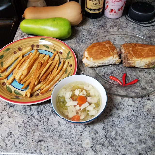 Roast Beef Poboy with Homemade Fries and 3 Chili Peppers and Peppers and a Small Bowl of Soup
