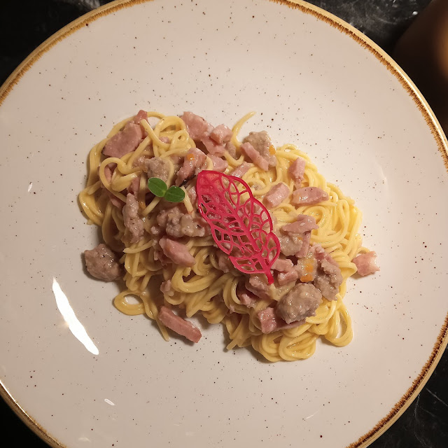 Tagliolini Con Ragù Di Salsiccia E Speck