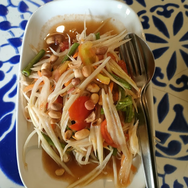 Papaya Salad with Carrots Tomatoes and Peanuts with a Soy Sauce