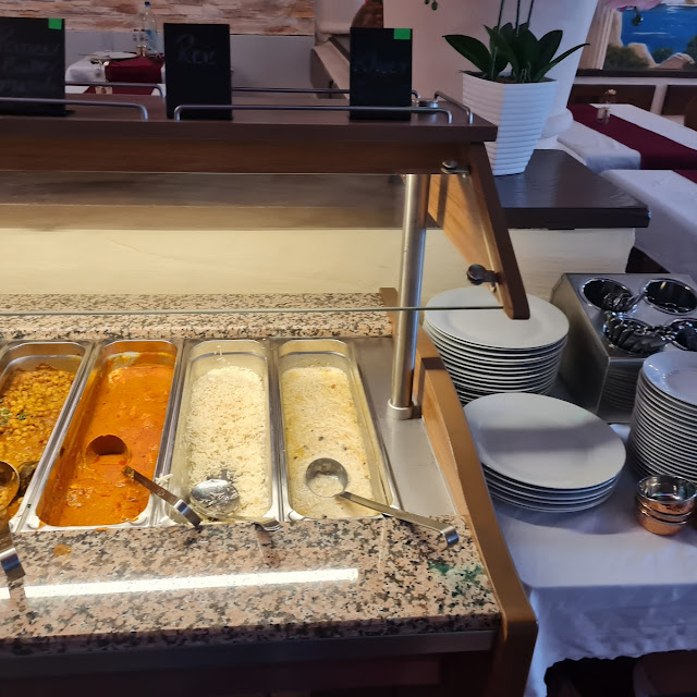 Matar Mushroom Sambar Chana Masala Paneer Butter Masala Rice Kheer Left to Right