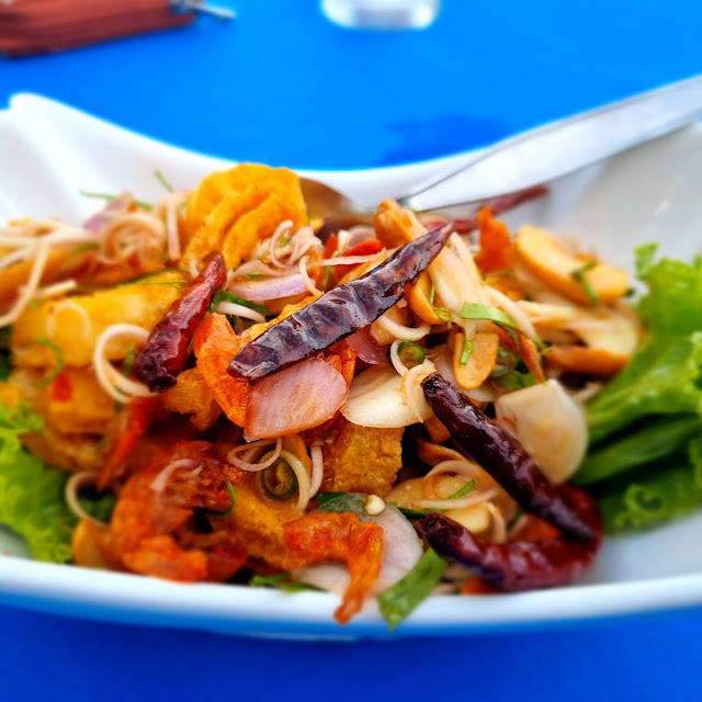 Raw Mango Salad with Crispy Squid Served In