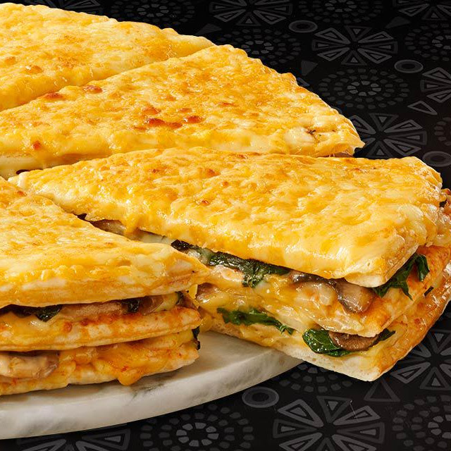 Three Layers of a Large Sweet Chilli Chicken Triple-Decker from Debonairs Pizza