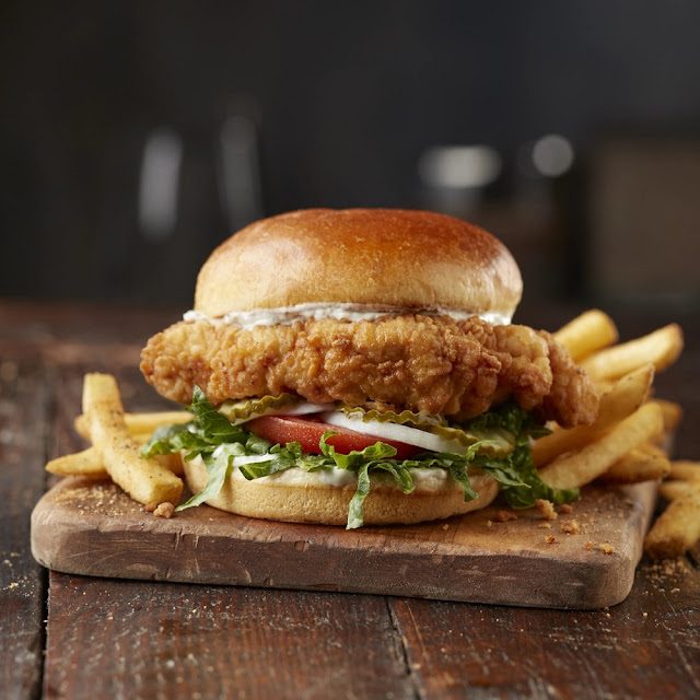 6 Oz Hand-Breaded Fried Chicken Breast with Lettuce Onion Tomato Pickles and Housemade Ranch