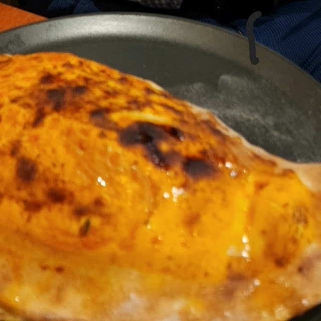 Calzone Bottom Centre And Crudaiola Top