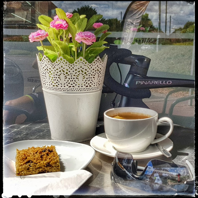 A Flapjack with an Americano Coffee Flowers Non Edible Ha Ha