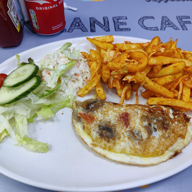 Masala Omelette with Peri Peri Chips and Coleslaw and Sald