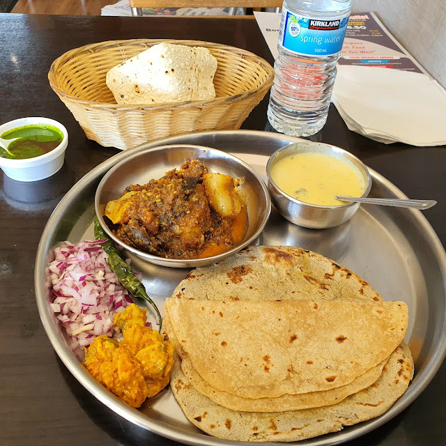 Thali with Spicy Sabji Roti Rotla & Kahdi & Rice