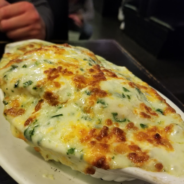 Baked Bass Fillet & Spinach on Rice in Cream Sauce