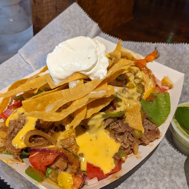 Nachos with Ground Beef Cheese & Side of Sour Cream