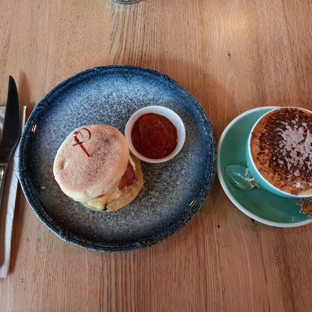 Egg and Bacon Muffin and Cappuccino