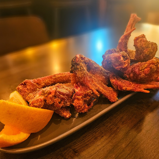 Duck Wings with an Orange Dusting