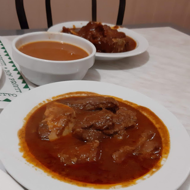Carne de Chivo Ternera Y Guandules Con Coco