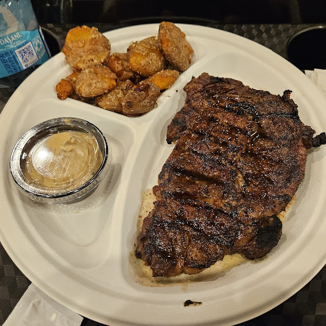 8 Oz Rib Eye and Parmesan Potatoes