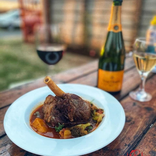 Large Lamb Shank Served With