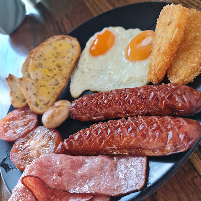 Big Breakfast with Eggs Your Way Bacons Mushrooms Tomato and Cheese Kransky