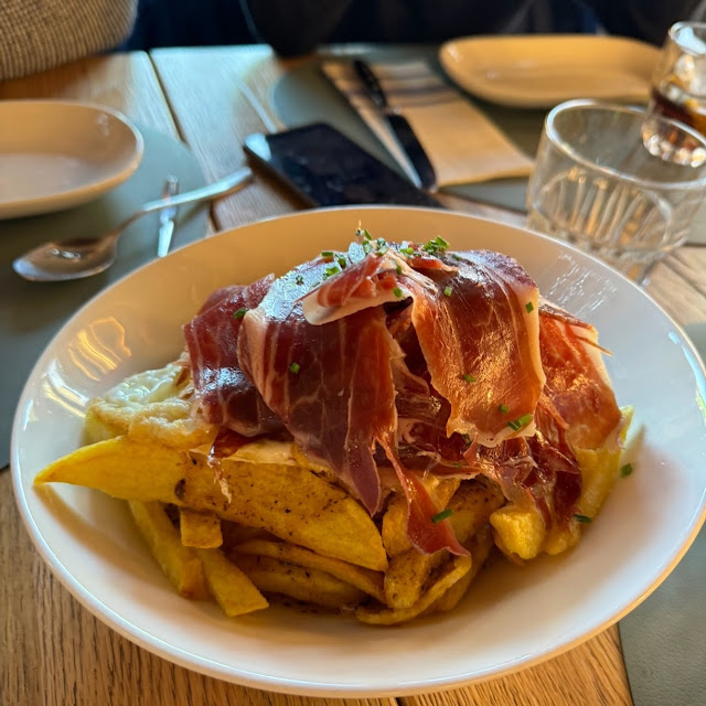 Huevos Rotos Con Jamon Iberico Y Yema Trufada