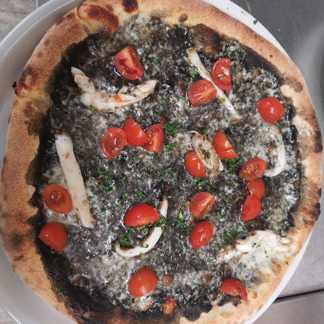 Nero Di Seppia Con Pomodorini E Calamari