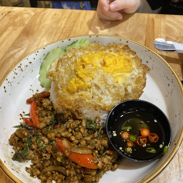 Stir Fried Pork with Thai Basil on Rice and Egg