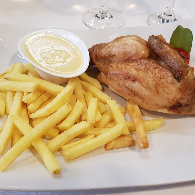Mezzo Pollo Con Patate Fritte