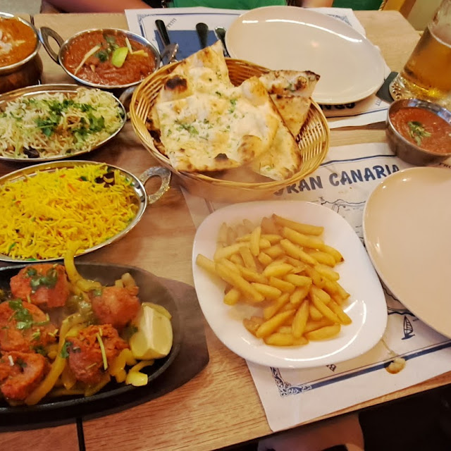 Garlic Naan Chicken Tikka Butter Chicken King Prawn Madras Mushroom Rice Pilau Rice Chicken Madras
