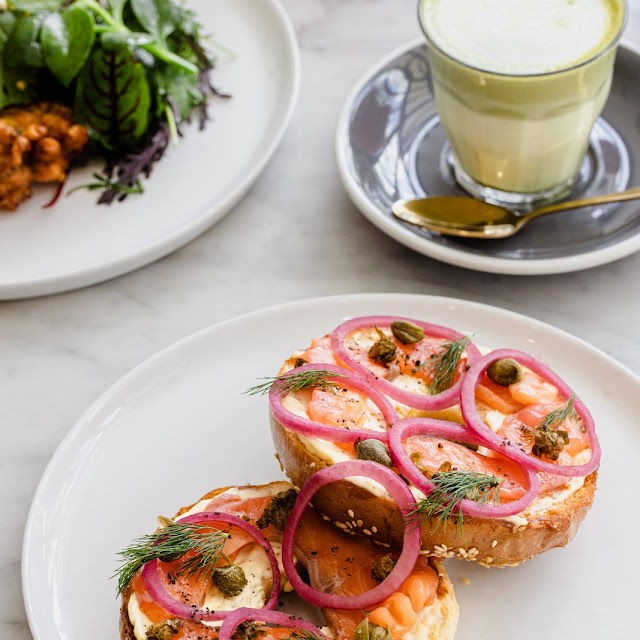 Salmon Bagel with Cream Cheese Cappers Dill Pickled Red Onion