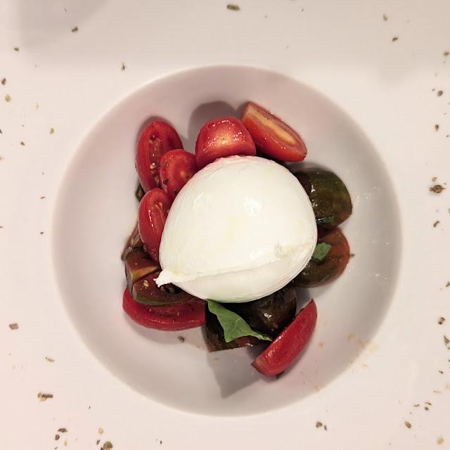 Crispy Organic Poached Egg with Burrata Cheese and Fresh Black Truffle