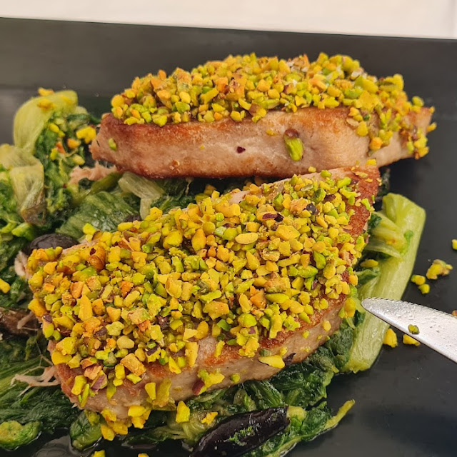 High Quality Seared Red Tuna in Ginger and Pistachios Crust with Endive and Black Olives