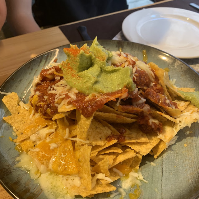Nachos with Cheddar Cheese and Guacamole