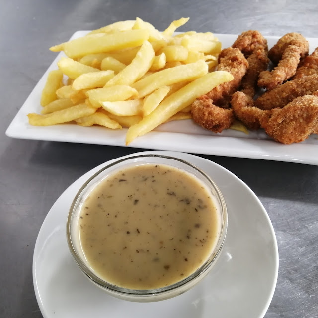 Chickens Trips Chips with Mushrooms Sauce Aside