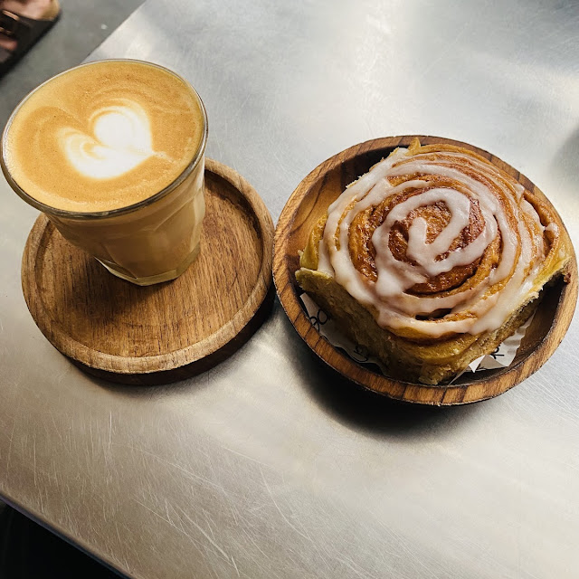 Cinnamon Roll and Cappuccino