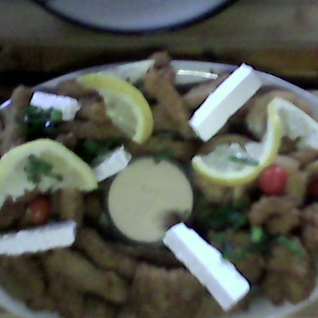 Crumbed Calamari Wor Gets Cheese
