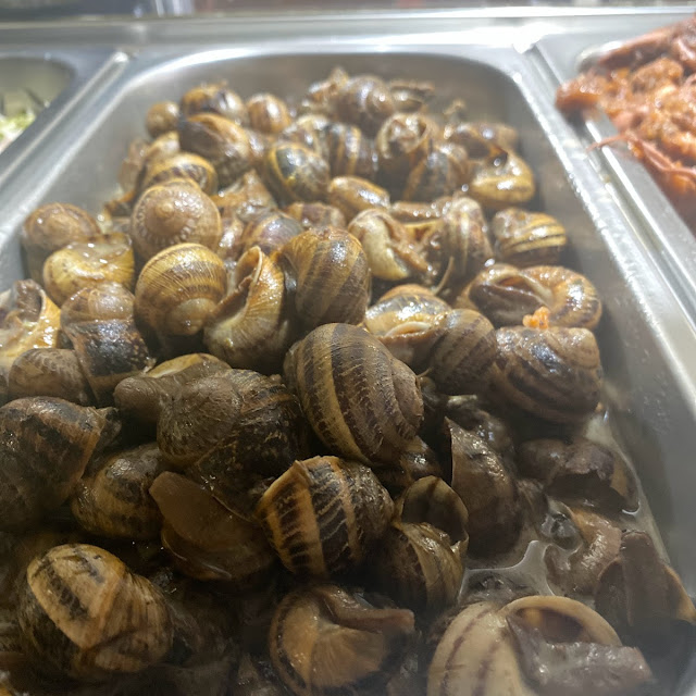 Caracoles Con Salsa
