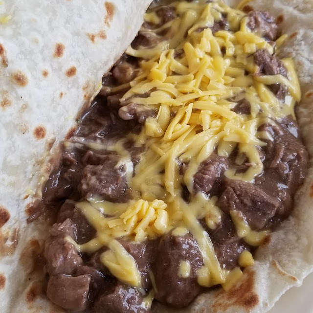 Carne Guisada Taco with Cheese