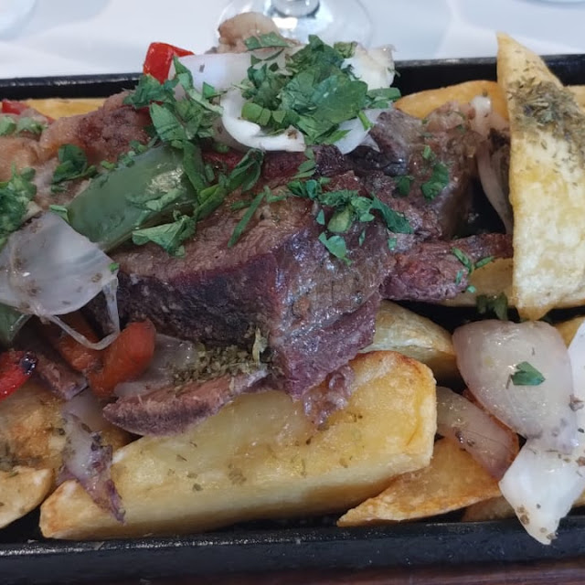 Asado de Tira Con Papas Al Horno