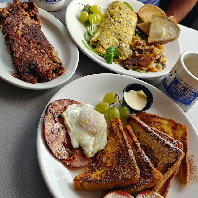Corned Beef Hash Feta and Tomato Omelette French Toast Deluxe and Coffee