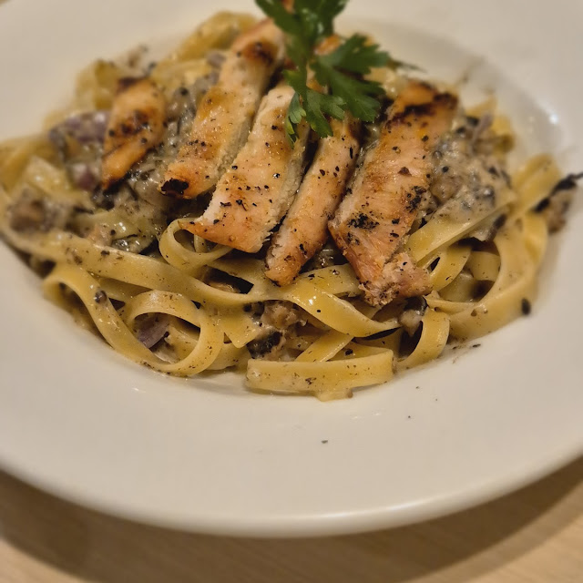 Top Dish Chicken Piccata Lower Dish Chicken with Mushrooms and Truffles