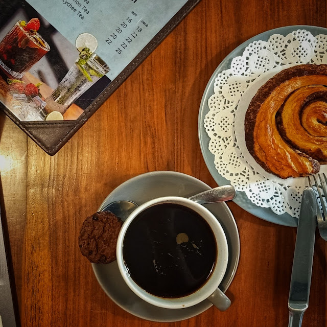 Americano Coffee and Cinnamon Bun