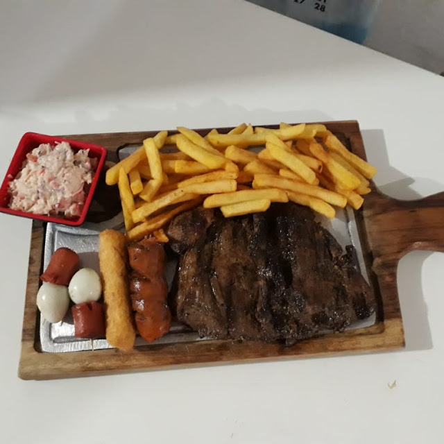 Tabla de la Casa Al Carbon