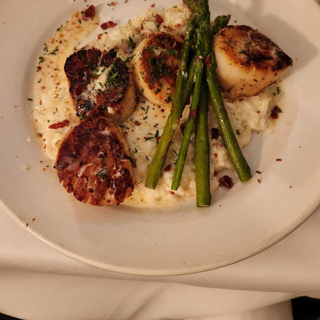 Sea Scallops over Mushroom Parmesan Risotto and Tomato Butter Sauce
