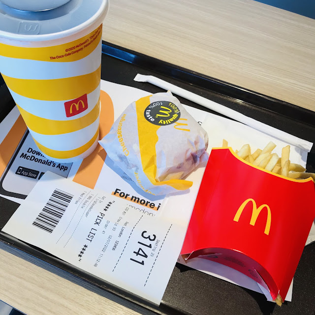 Cheeseburger with Fries and Coca Cola
