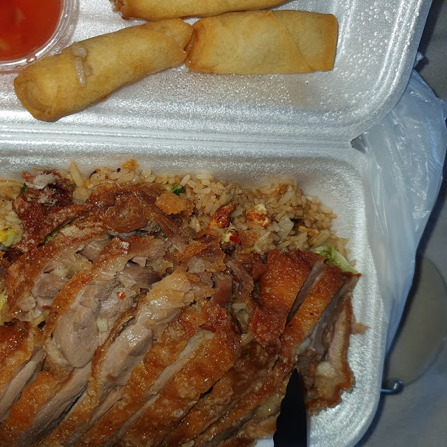 Knusprige Ente Mit Reis Und Frühlings Rollen