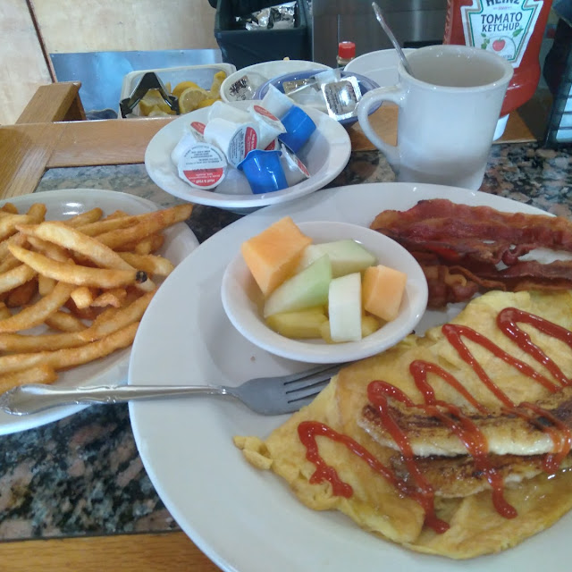 Campbell Eggs with American Cheese Bacon Rye Toast and Fruit