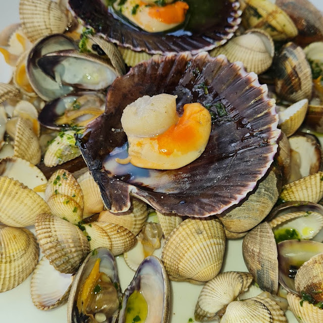 Parte de Mariscada Caliente